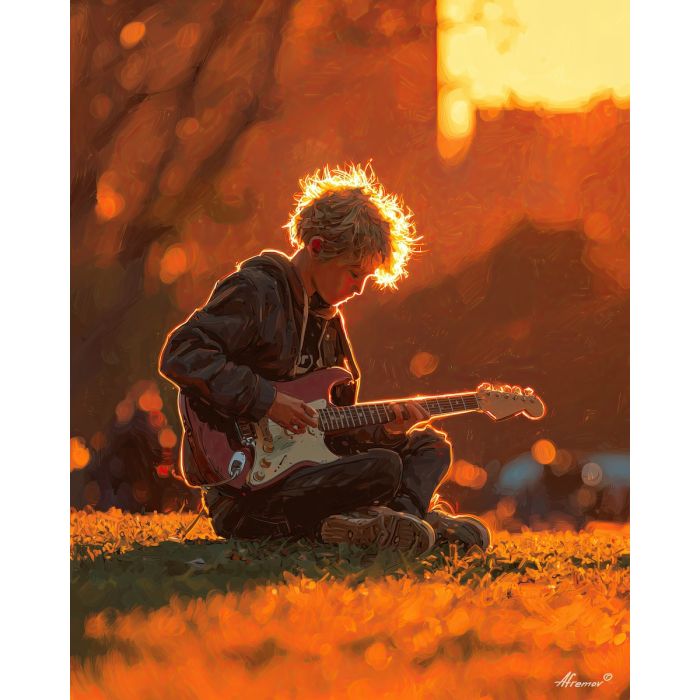 BOY PLAYING GUITAR