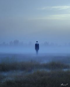 MAN IN BLUE FOG