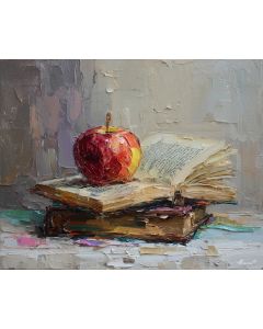 APPLE BESIDE BOOK