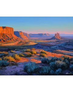 SUNRISE OVER RED MESAS IN BLUE HOUR